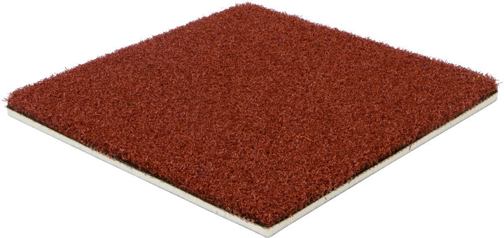 The Collegiate Sports Turf by Athletic Textiles is a square red tile with a white backing, shown on white.